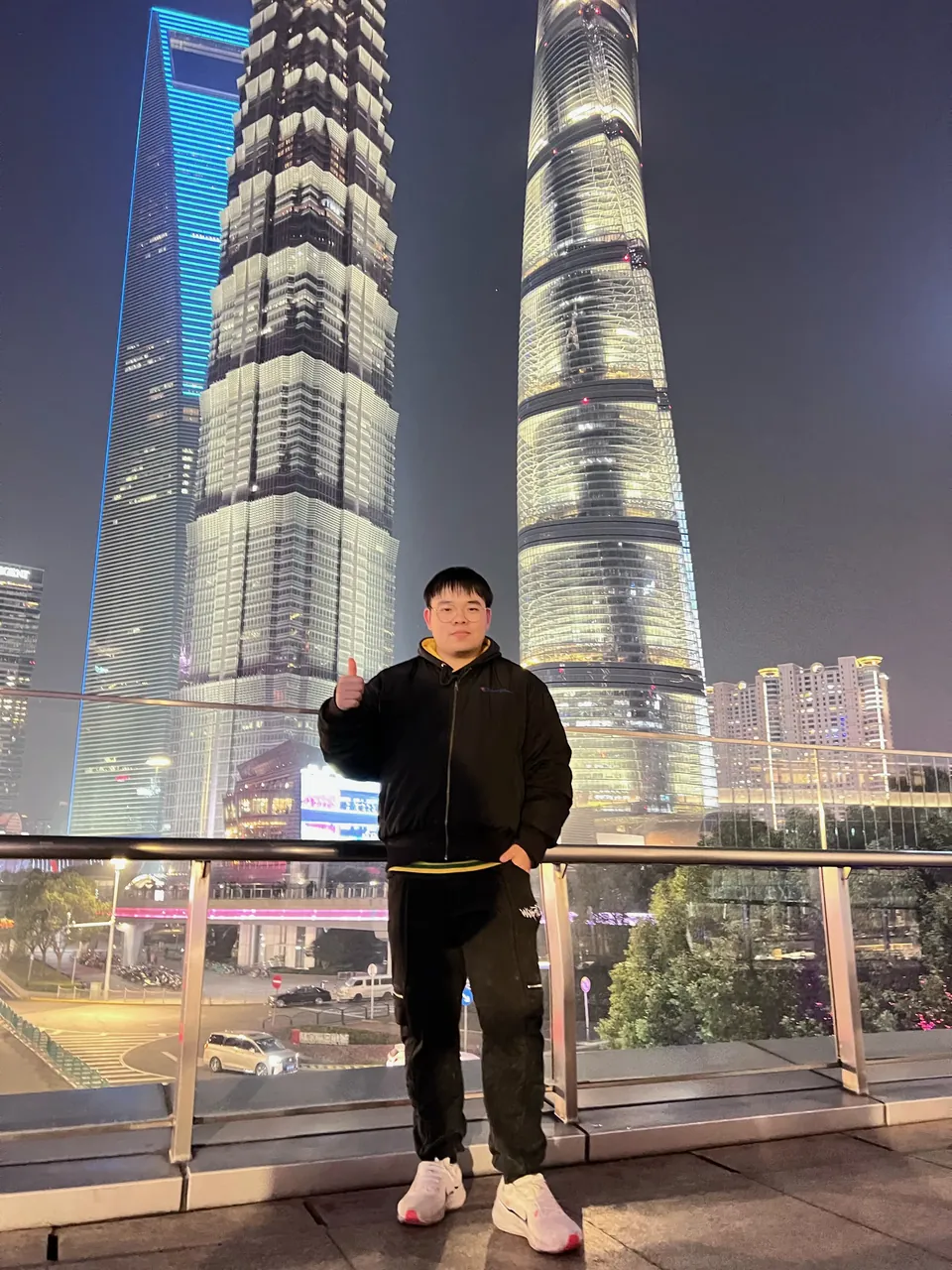 Jinhao at night under the Shanghai Tower and its neighbors